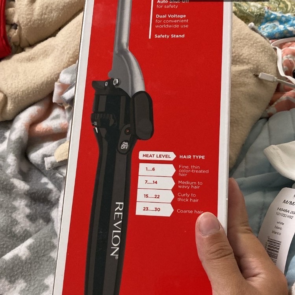 I’m selling a revlon heating curler silver and black
